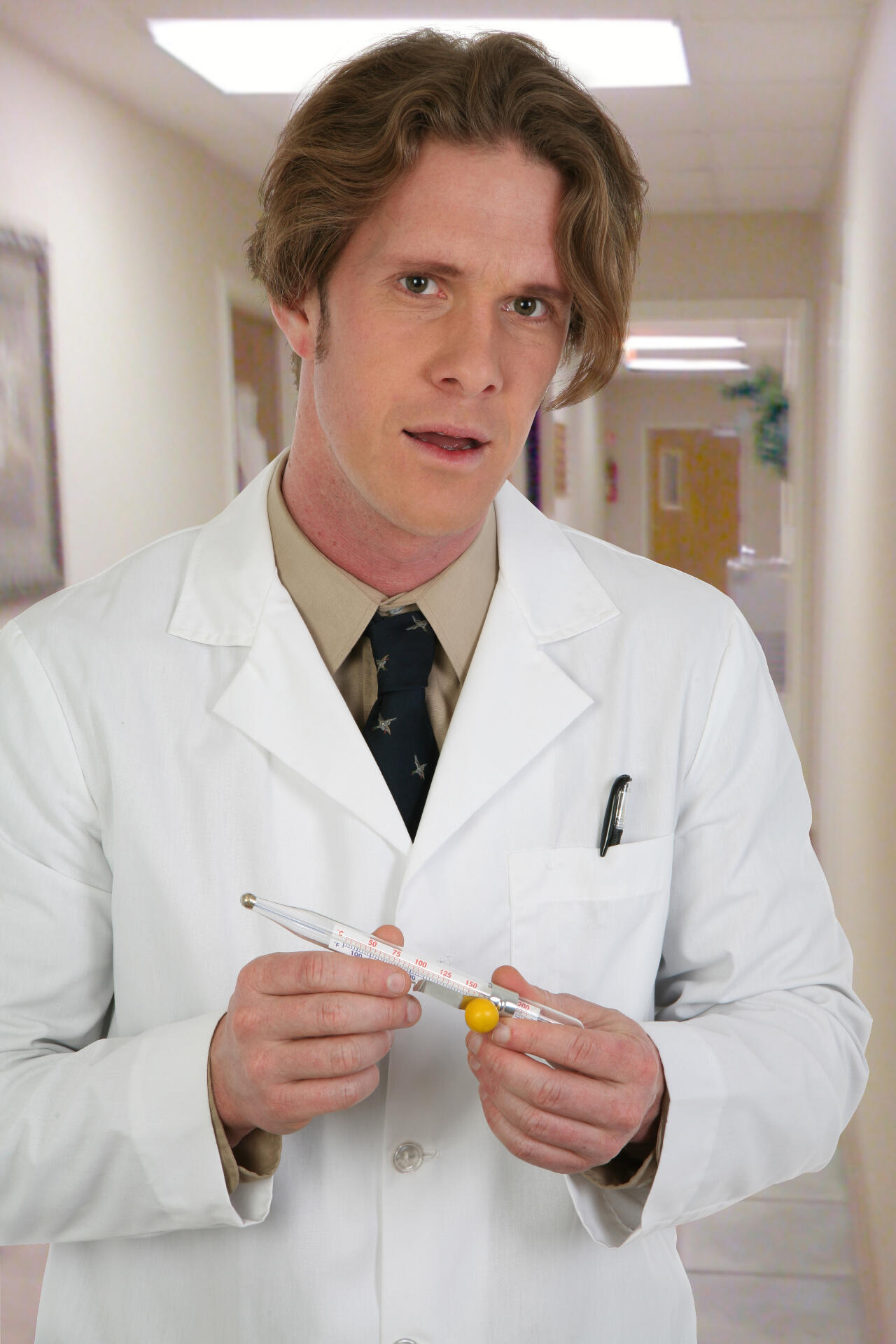 Fart doctor holding rectal thermometer
