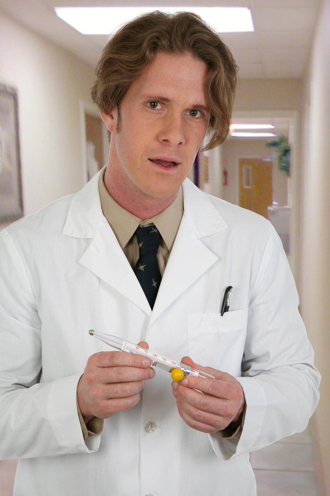Fart doctor holding rectal thermometer
