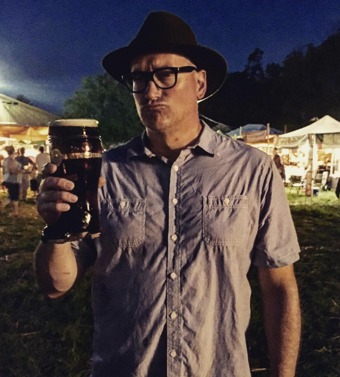 Toby holding beer and fueling up for fart